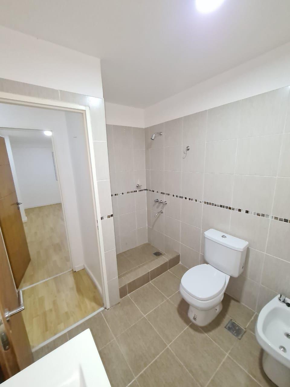 Duplex de 3 ambientes con patio jardín y parrilla en venta en San Vicente