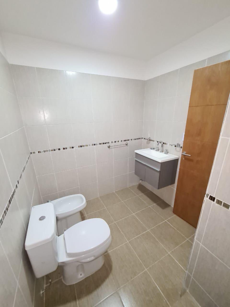 Duplex de 3 ambientes con patio jardín y parrilla en venta en San Vicente