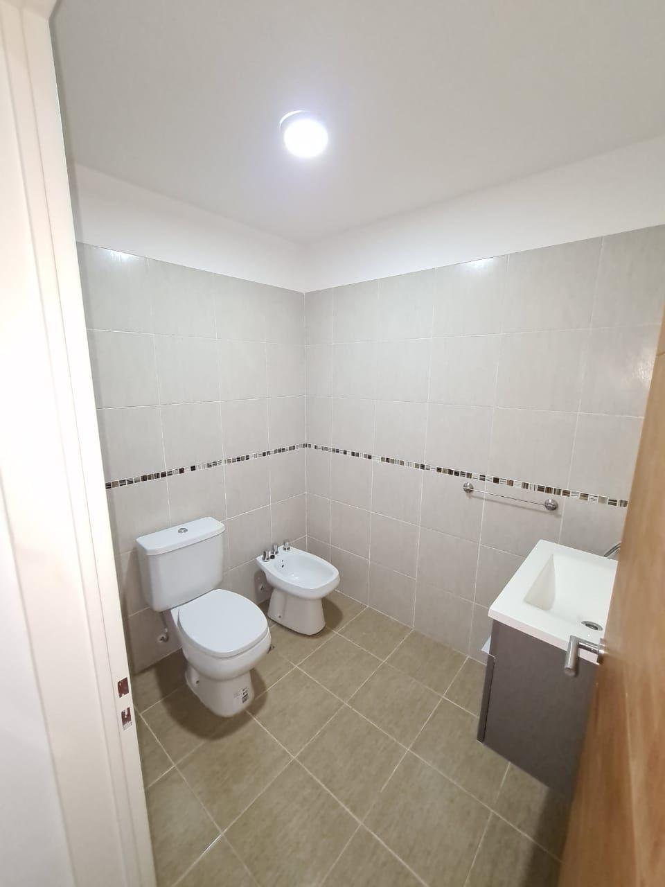 Duplex de 3 ambientes con patio jardín y parrilla en venta en San Vicente