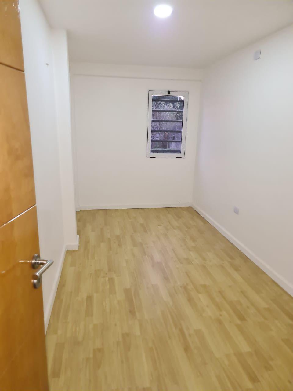 Duplex de 3 ambientes con patio jardín y parrilla en venta en San Vicente